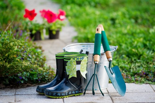 Gardener and van outside a Balham property preparing tools